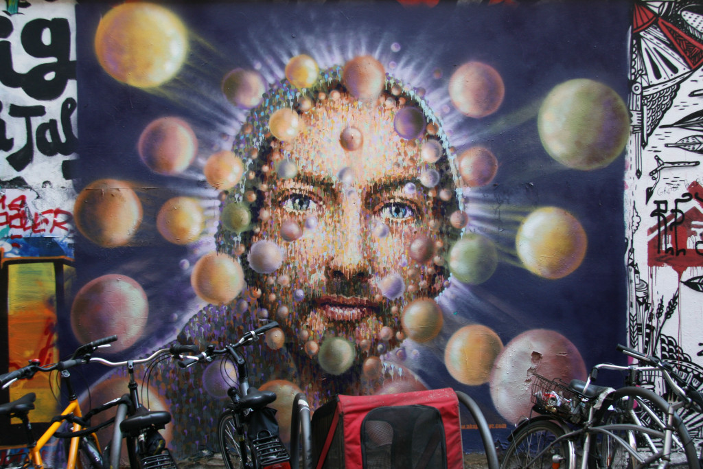 Man with Spheres: Street Art by Jimmy C in Berlin