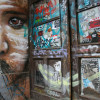 All those in favour say 'Eye': Street Art by Matt Adnate in a Berlin doorway