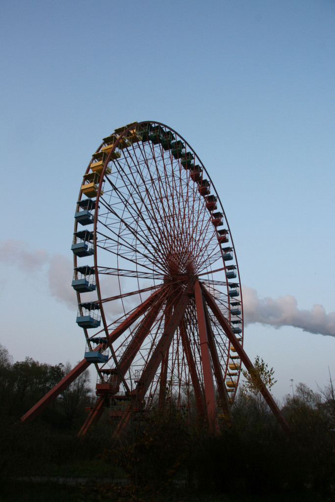 Cloud Crosses the Ferris Wheel (Riesenrad) at Spreepark Plänterwald, an abandoned Theme Park in Berlin