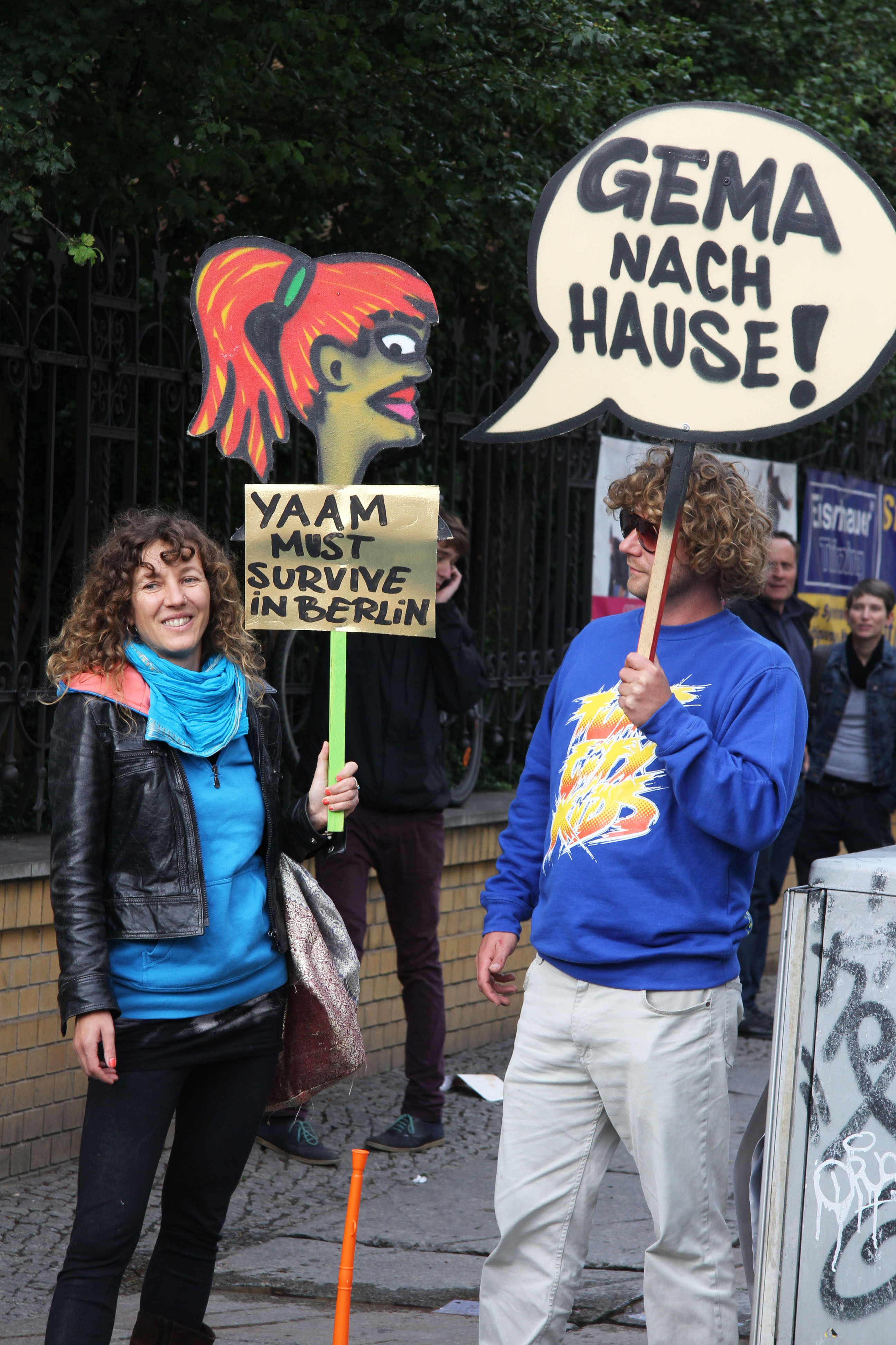Protesters hold placards at the GEMA protest at the Kulturbrauerei in Berlin