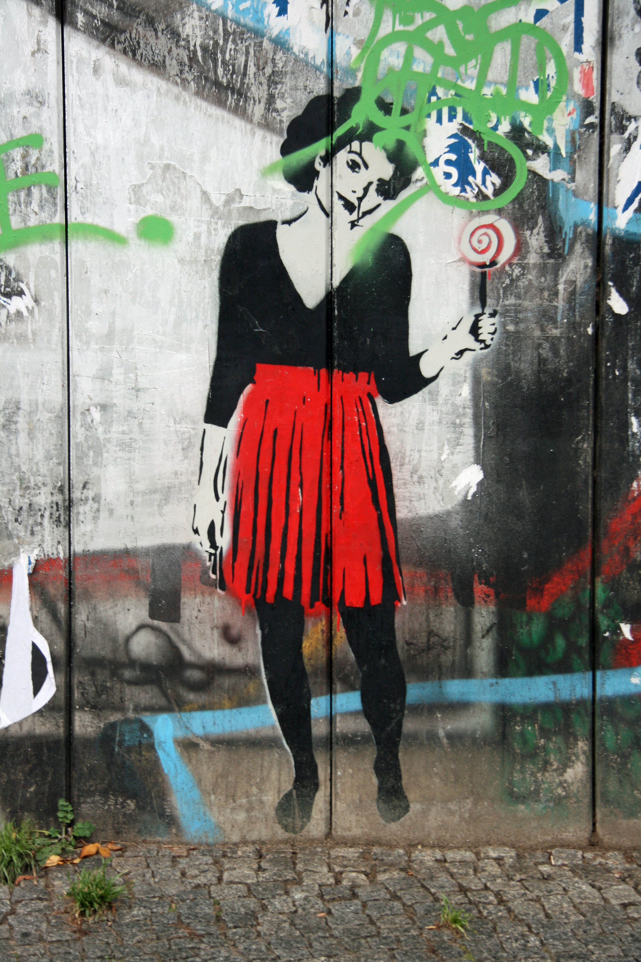 Girl in a Red Skirt: Street Art by Unknown Artist in Berlin