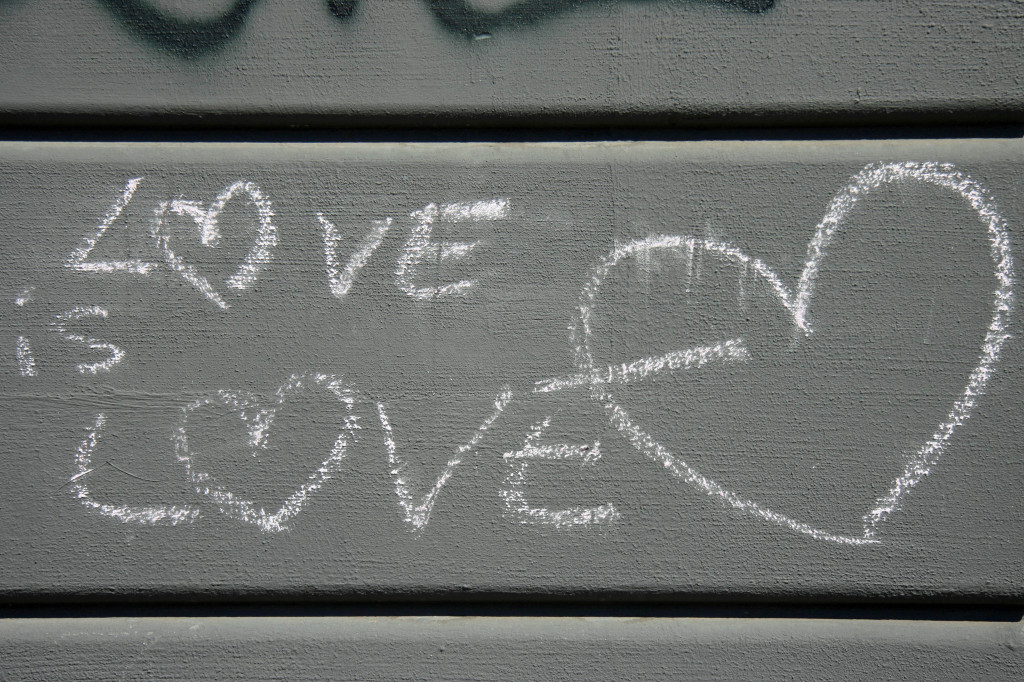 Love Is Love: Street Art chalked on a wall in Berlin by Unknown Artist
