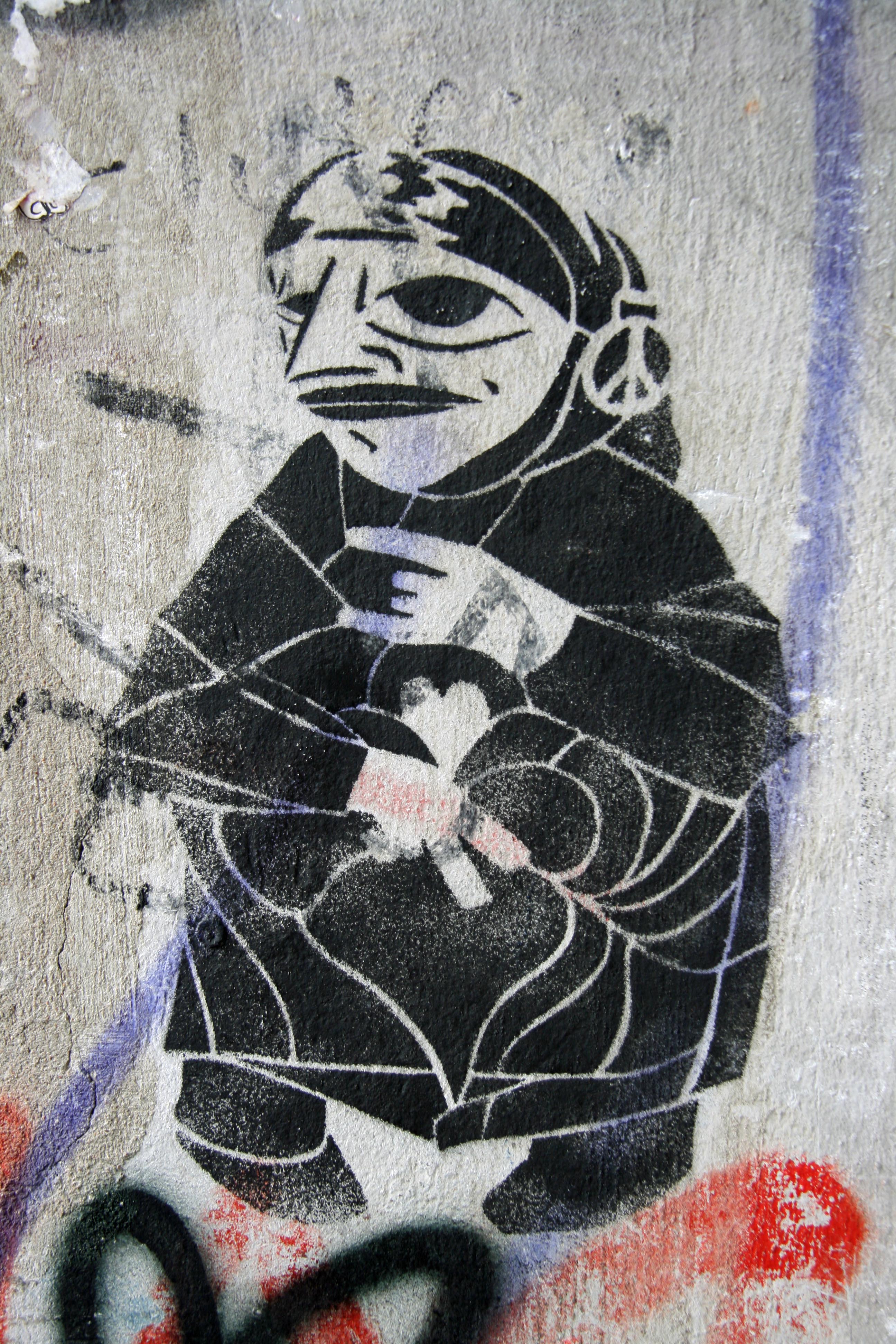 Old Woman: Street Art by Unknown Artist in Berlin