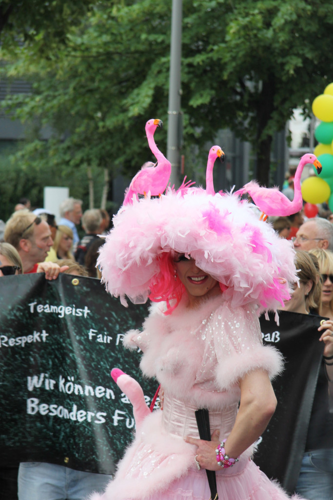 Pink Flamingos: A reveller at the Christopher Street Day Parade (CSD) in Berlin enjoys the attention of the gathered photographers