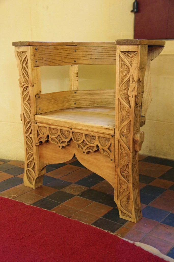 A carved chair in the Well Tower at Castell Coch (Red Castle) near Cardiff