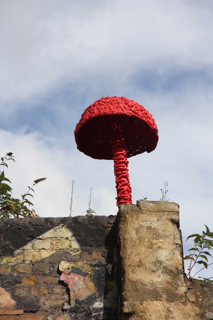 Red Mushroom: Street Art by Christiaan Nagel on Brick Lane in East London