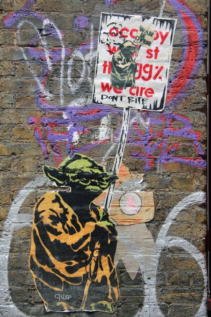 Yoda Protesting for the Occupy movement - Street Art by CRISP in East London