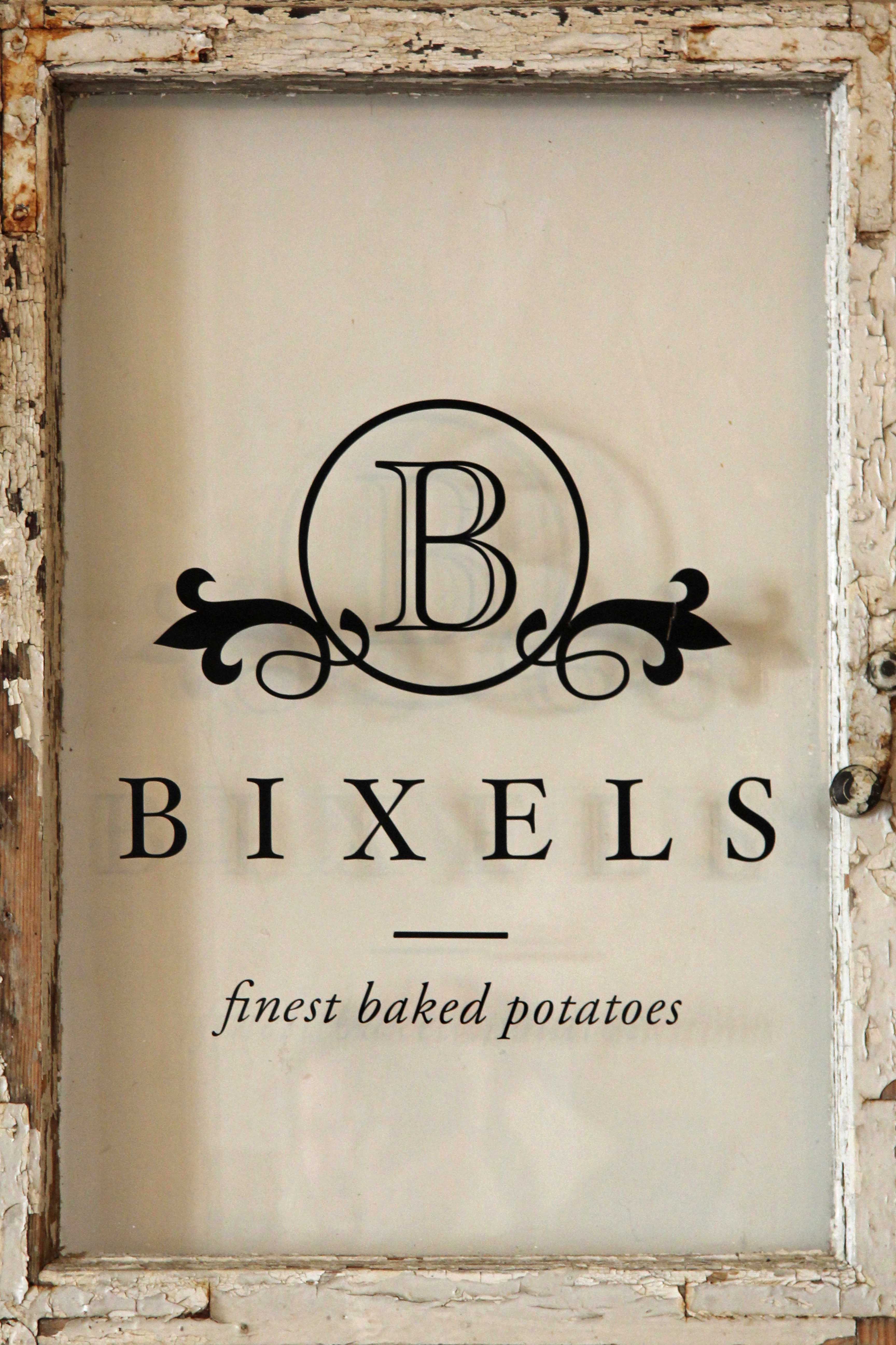The Bixels logo on an old window in Bixels in Berlin Mitte