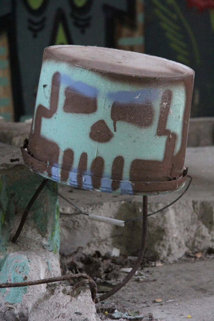 Bucket Skull: Street Art by Unknown Artist at Papierfabrik Wolfswinkel near Berlin