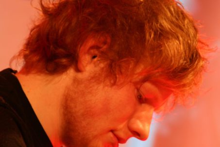 Ed Sheeran signing autographs for fans at Alexa Berlin
