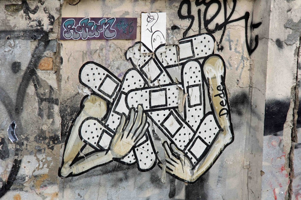 Arms Full of Plasters (Caffeine) - Street Art by Dede in Berlin