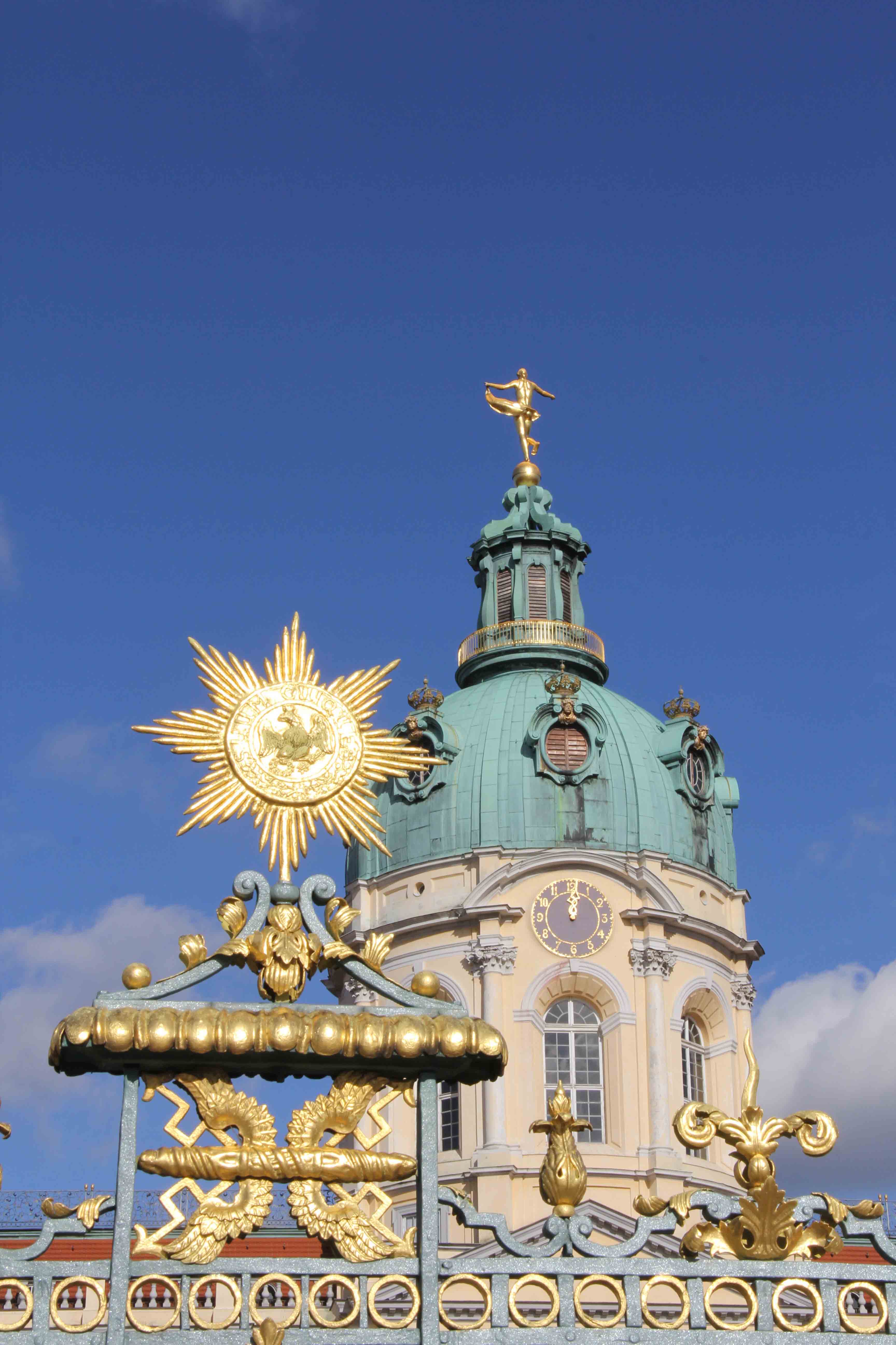 The ornate gates and cupola of Schloss Charlottenburg in Berlin