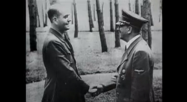 Albert Speer shakes hands with Adolf Hitler in a still from the documentary: Hitler's Henchmen - Speer - The Architect