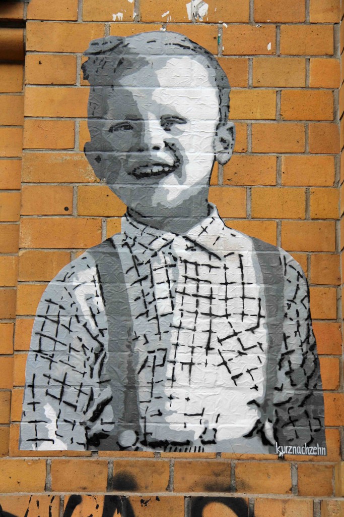 Boy With Braces - Street Art by kurznachzehn in Berlin