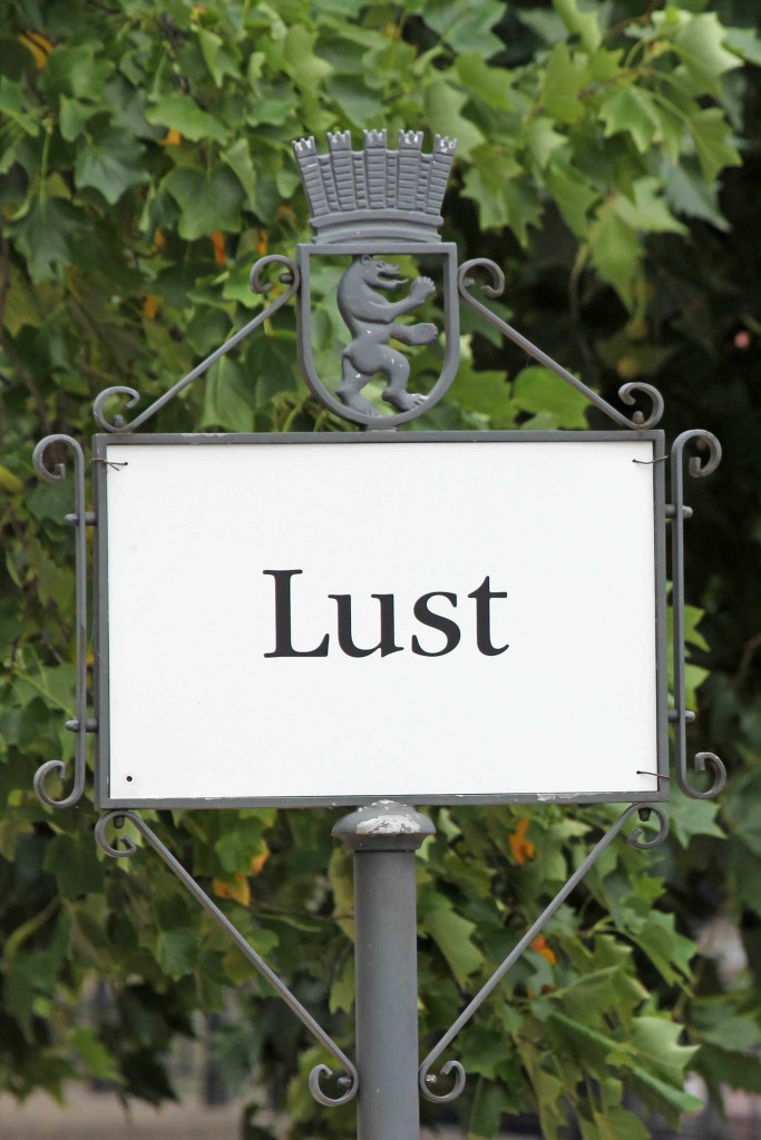 Lust - a sign at the Lustgarten in Berlin has been altered