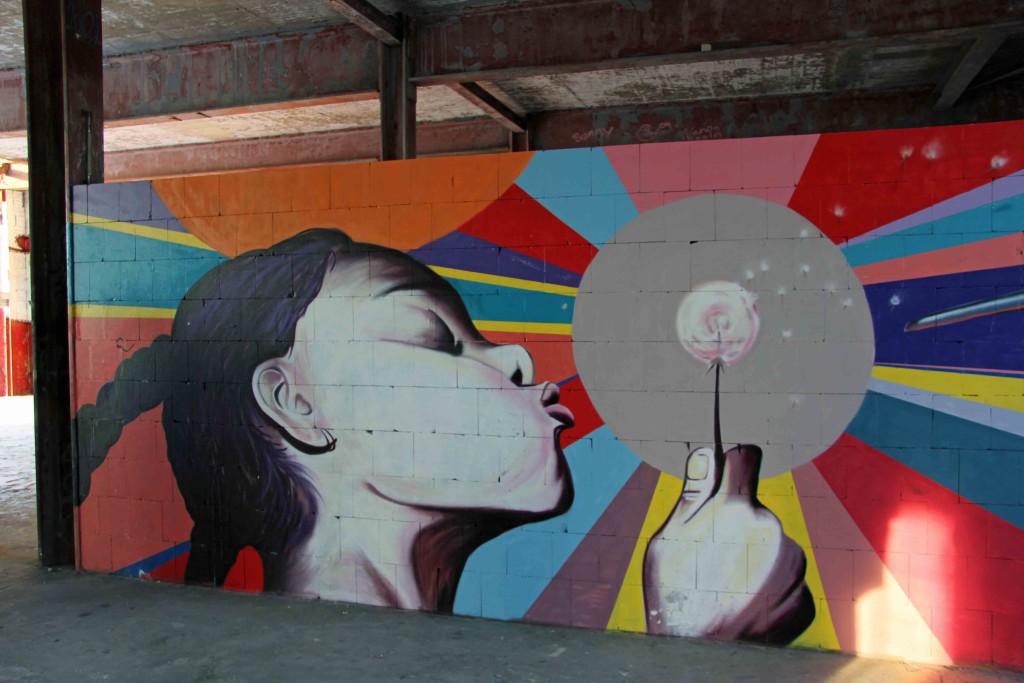 Girl With Dandelion - Street Art by Unknown Artist (painted for Artbase 2012) at the former NSA Listening Station at Teufelsberg Berlin