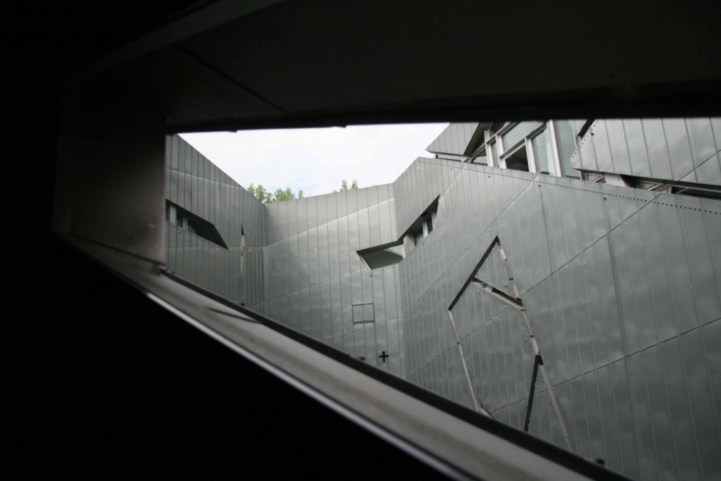 A view out of an opening in The Libeskind Building of the Jewish Museum Berlin