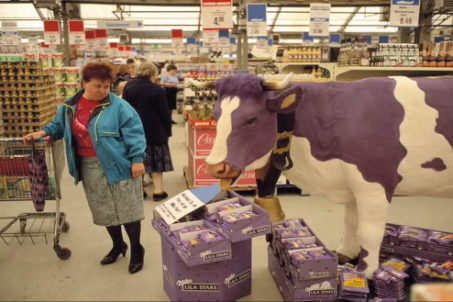 East German lady and Milka Cow - Thomas Hoepker for Magnum