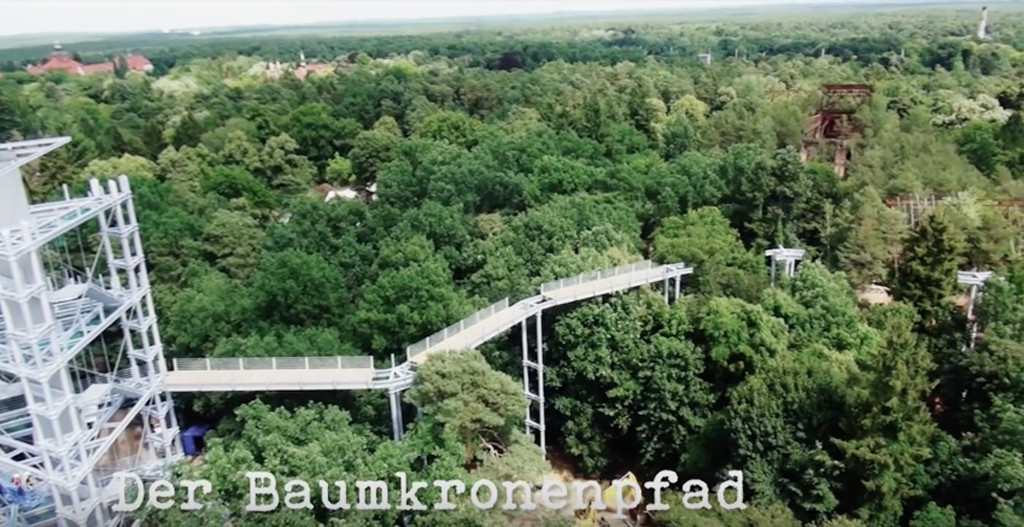 Screenshot from Making of Baumkronenpfad Beelitz-Heilstätten by Thomas Kaser showing the treetop walkway at the abandoned lung clinic and sanatorium under construction