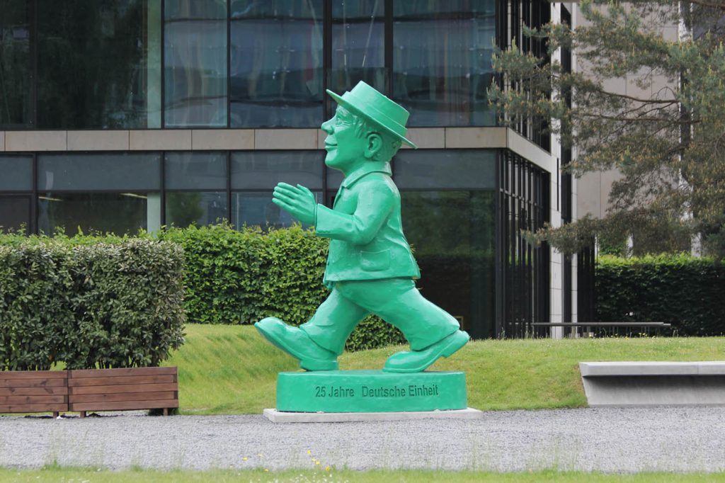 The giant Ampelmann statue by Ottmar Hörl for the 25th anniversary of German reunification outside the Hessische Landesvetretung in Berlin side view