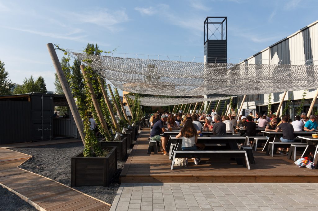 The beer garden at BRLO Brwhouse - a craft beer brewery, bar, restaurant and beer garden and the edge of Park am Gleisdreieck in Berlin