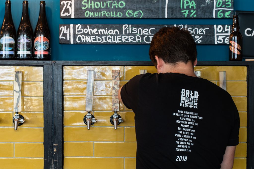 Vadim pours a beer at Protokoll Taproom Berlin, a craft beer bar with 24 taps in Berlin Friedrichshain